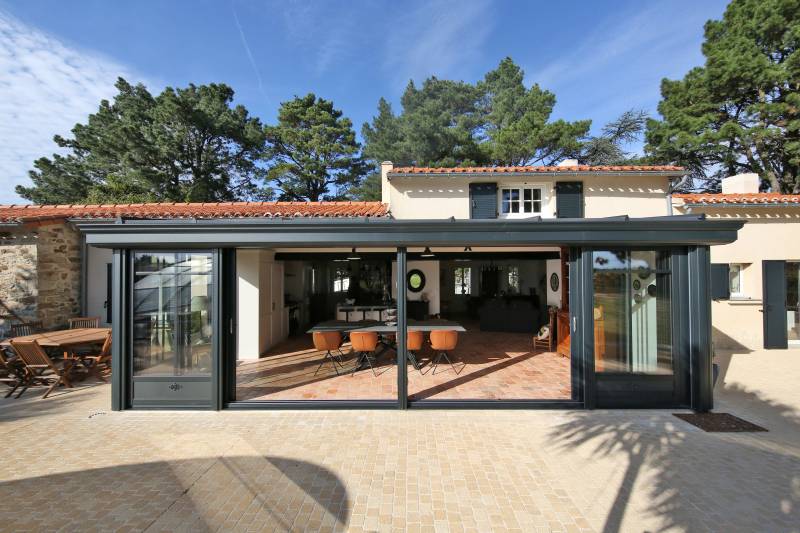 Véranda pièce de vie en aluminium à Bordeaux proche de Cenon