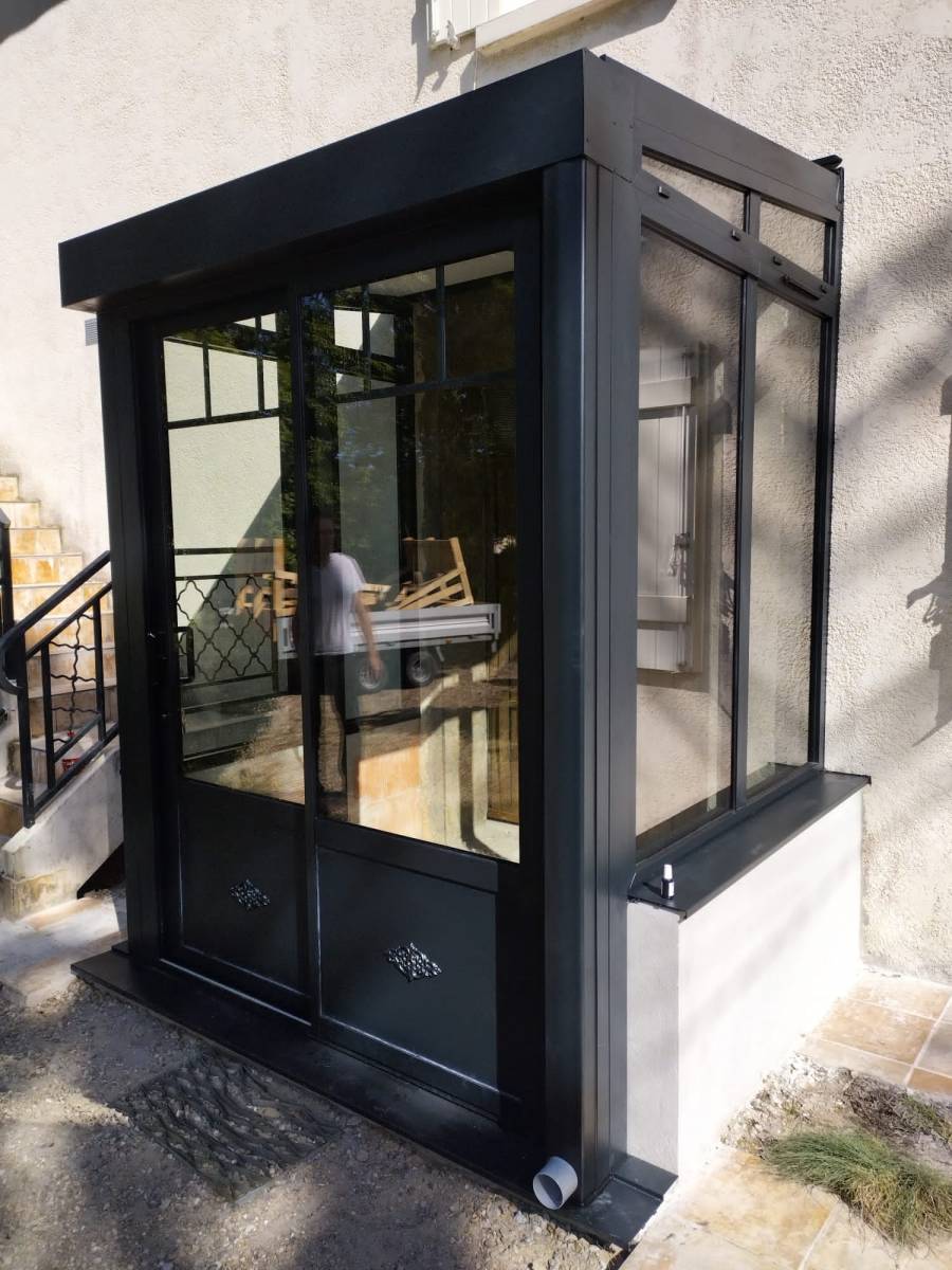 Sas d'entrée renoval en aluminium de qualité coloris noir à Bruges en gironde 